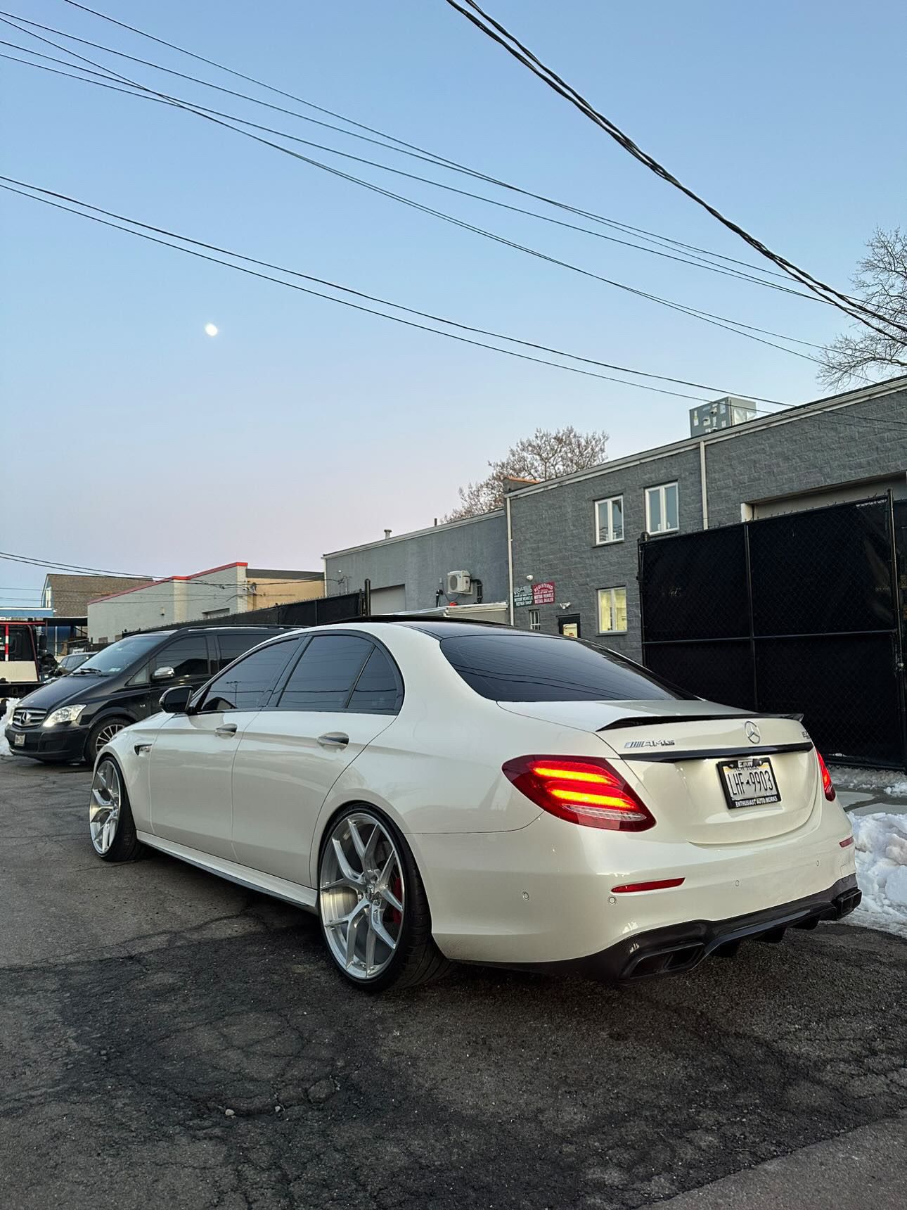Mercedes-Benz E63s with Motivo Forged MB-H custom wheels in gloss brushed clear finish rear side view