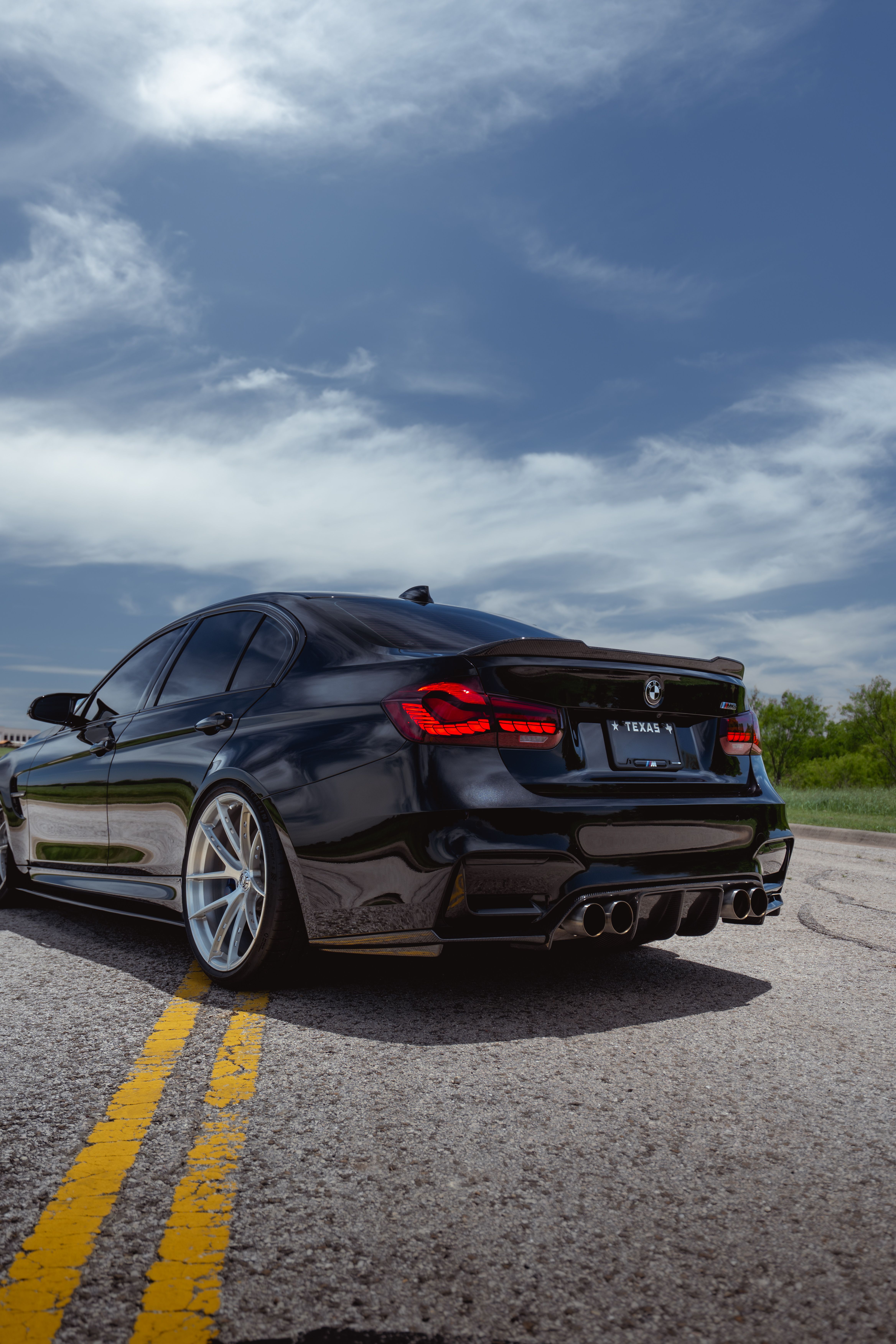 BMW M3 with Motivo Forged MB-k custom wheels in gloss brushed clear finish rear close up view