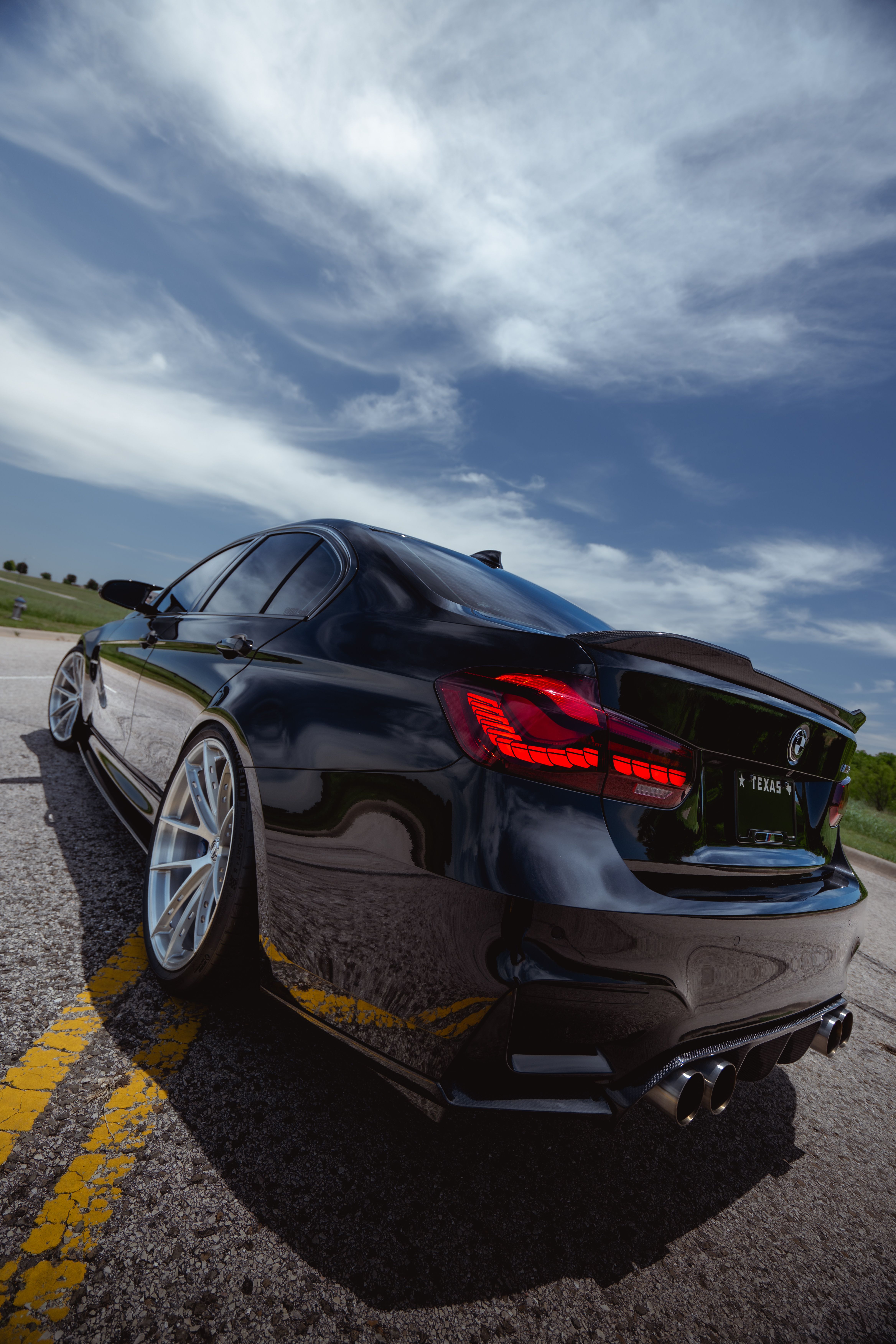 BMW M3 with Motivo Forged MB-k custom wheels in gloss brushed clear finish rear close up view