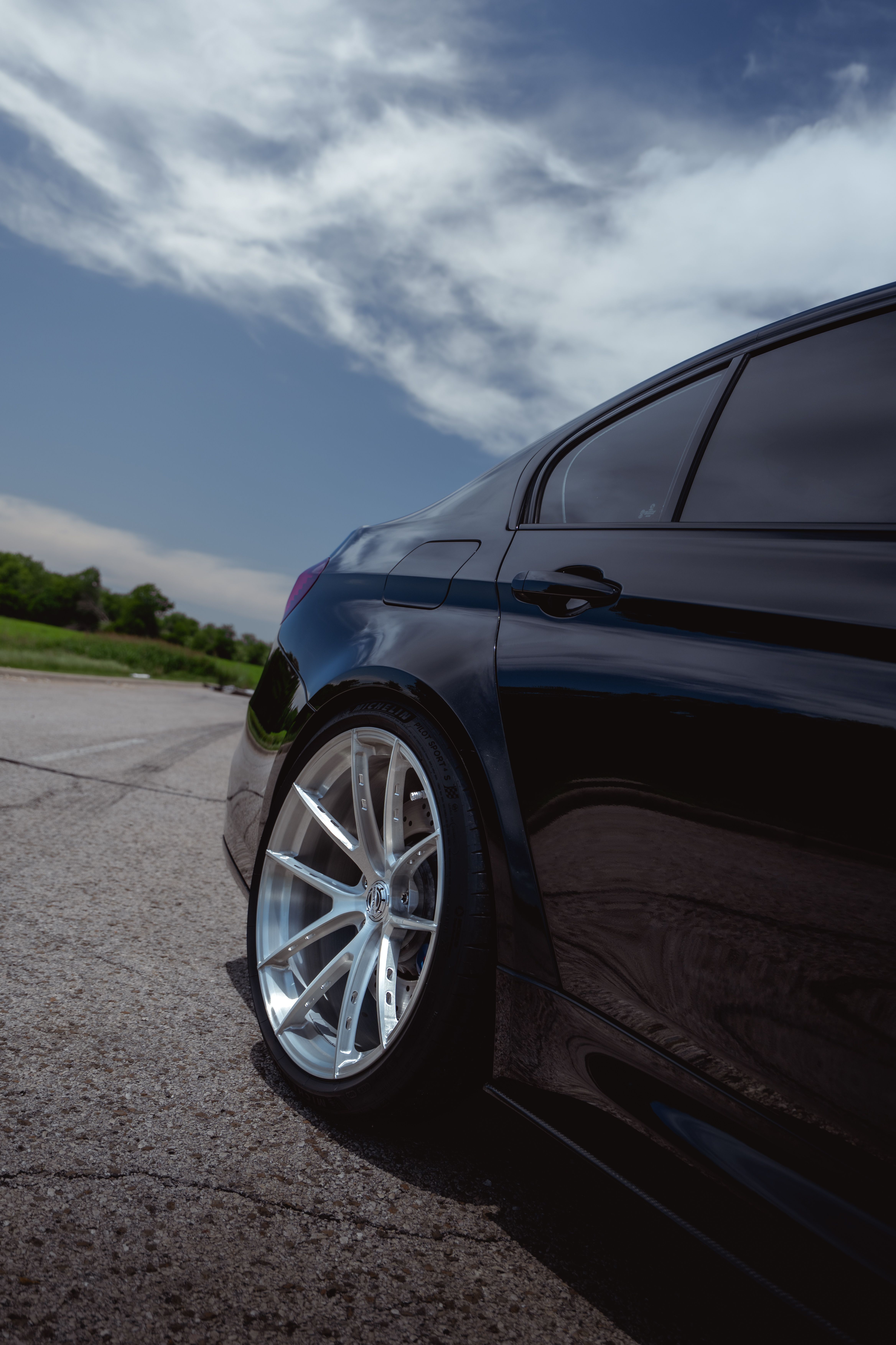 BMW M3 with Motivo Forged MB-k custom wheels in gloss brushed clear finish rear wheel view