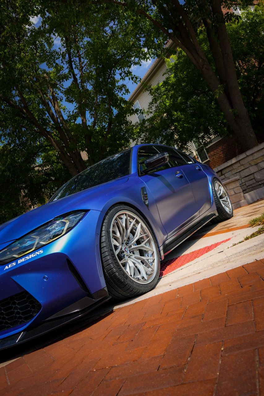 BMW M3 G80 with Motivo Forged CS-J custom wheels in gloss brushed clear face and gloss polished clear front half view